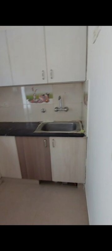 Kitchen in 2 BHK Apartment at Meenal Balmukund Residency, Raj Nagar Extension – for Sale