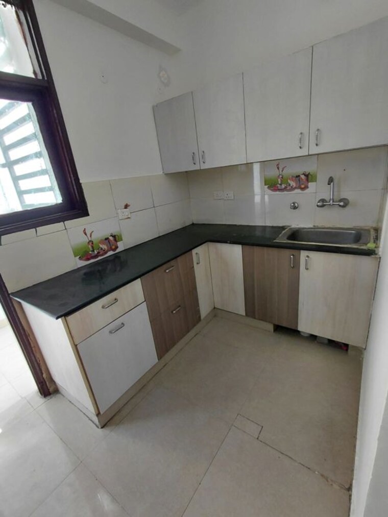 Kitchen, meenal-balmukund-residency 2 Bedroom 950 Sq.Ft. Apartment In Raj Nagar Extension Ghaziabad 10076396