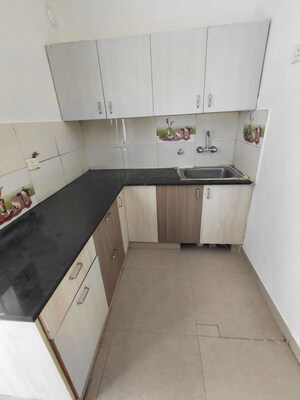 Kitchen in 2 BHK Apartment at Meenal Balmukund Residency, Raj Nagar Extension – for Sale