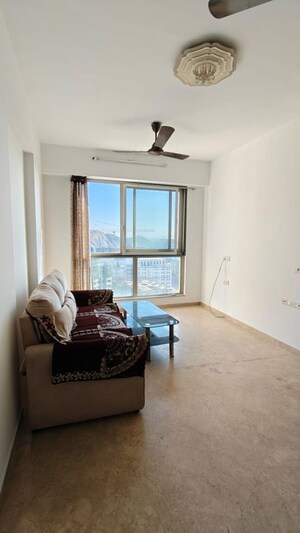 Living Room in 1 BHK Apartment at Hiranandani Zen Maple, Powai – for Rent