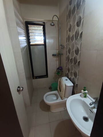 Bathroom in 1 BHK Apartment at Ajmera Yogidham Emerald, Kalyan West – for Rent