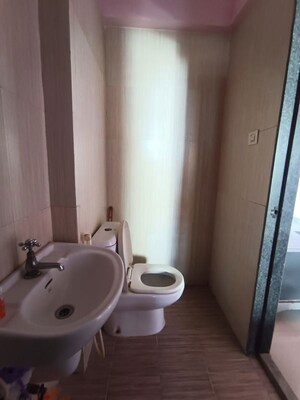 Bathroom in 1 BHK Apartment at Ajmera Yogidham Emerald, Kalyan West – for Rent
