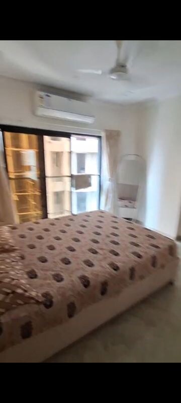 Bedroom in 2 BHK Apartment at Svarna Rosemary, Mahim West – for Rent