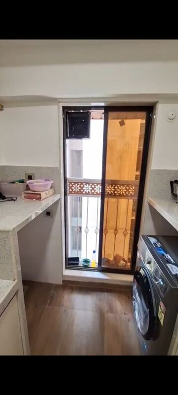 Kitchen in 2 BHK Apartment at Svarna Rosemary, Mahim West – for Rent