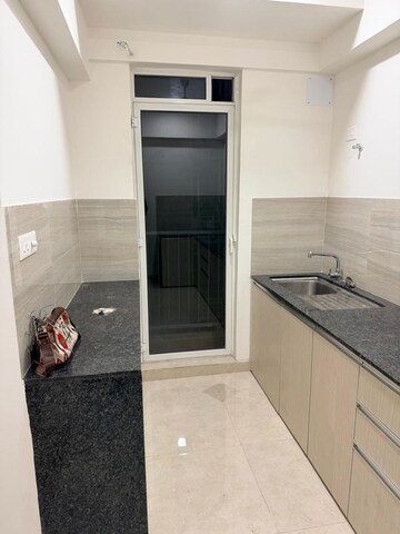 Kitchen in 2 BHK Apartment at Kalpataru Immensa, Kolshet Road – for Rent