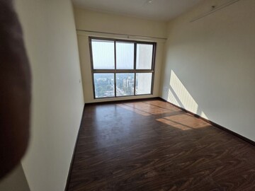 Room in 2 BHK Apartment at Raj Infinia, Malad West – for Rent