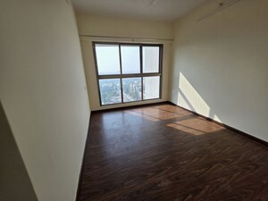 Room in 2 BHK Apartment at Raj Infinia, Malad West – for Rent