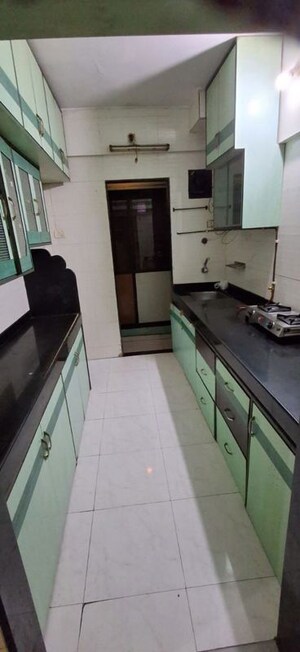 Kitchen in 2 BHK Apartment at Lake Bloom, Powai – for Sale