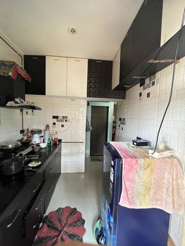 Kitchen in 2 BHK Apartment at Dev Entilla By Dev, Shirgaon – for Sale
