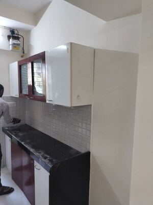 Kitchen in 1 BHK Apartment at VR Bhoomi Acres F Wing, Ghodbunder Road – for Rent