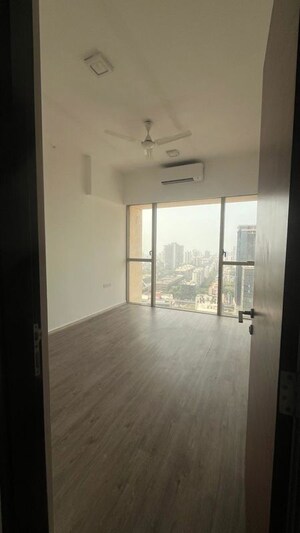 Room in 2 BHK Apartment at Transcon Triumph Tower, Andheri West – for Rent