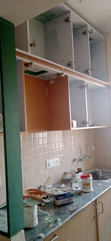 Kitchen in 1 BHK Apartment at Amrapali Dream Valley, Tech Zone 4 Greater Noida – for Rent
