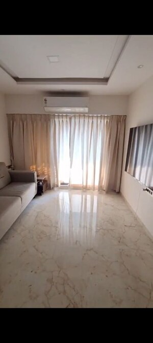Bedroom in 2 BHK Apartment at Svarna Rosemary, Mahim West – for Rent