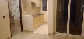 Kitchen in 1 BHK Apartment at Amrapali Dream Valley, Tech Zone 4 Greater Noida – for Rent