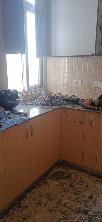 Kitchen in 1 BHK Apartment at Amrapali Dream Valley, Tech Zone 4 Greater Noida – for Rent