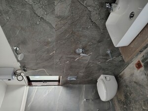Bathroom in 3 BHK Apartment at Unique Aura Mumbai, Santacruz West – for Sale