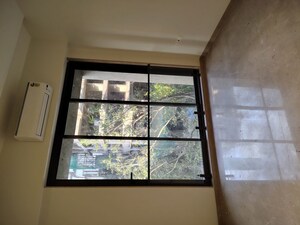 Bedroom in 2 BHK Apartment at Unique Aura Mumbai, Santacruz West – for Sale