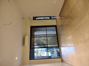 Living Room in 2 BHK Apartment at Unique Aura Mumbai, Santacruz West – for Sale