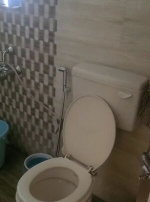 Bathroom in 2 BHK Apartment at Tirupati Balaji Platinum, Virar West – for Sale