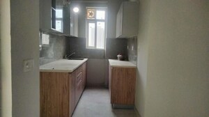 Kitchen in 2 BHK Apartment at Signature Global City, Sector 37d – for Rent