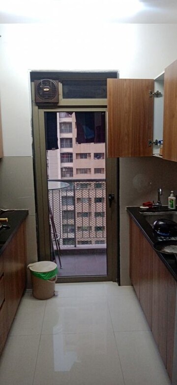 Kitchen in 2 BHK Apartment at Lodha Splendora, Ghodbunder Road – for Sale