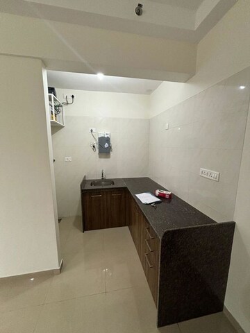 Kitchen in 1 BHK Apartment at Duville Riverdale Suites, Kharadi – for Rent