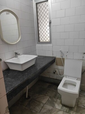 Bathroom in 2 BHK Apartment at Shipra Suncity, Vaibhav Khand – for Rent