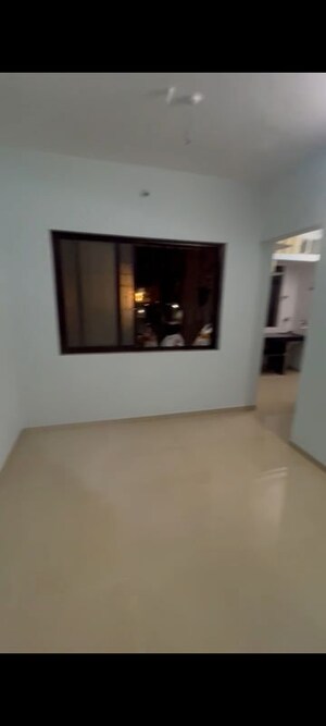 Living Room in 1 BHK Apartment at Evergreen city, Mira Road – for Sale