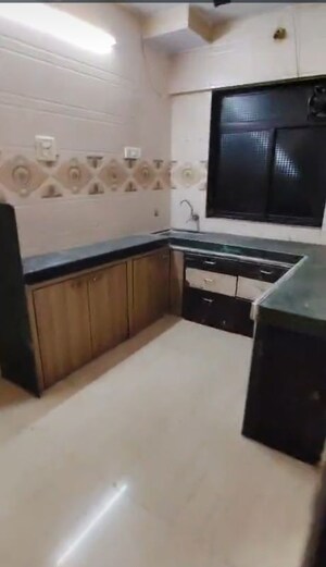 Kitchen in 2 BHK Apartment at Asmita CHS Kalwa, Kalwa – for Rent
