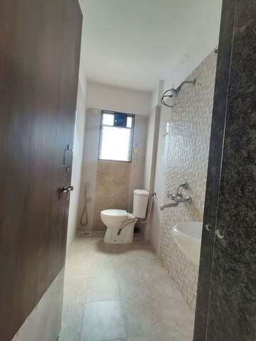 Bathroom in 2 BHK Apartment at Vijayalaxmi Laxmisatyam Residency, Dhanori – for Rent