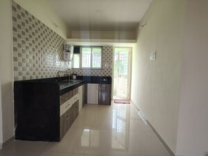 Kitchen in 2 BHK Apartment at Vijayalaxmi Laxmisatyam Residency, Dhanori – for Rent