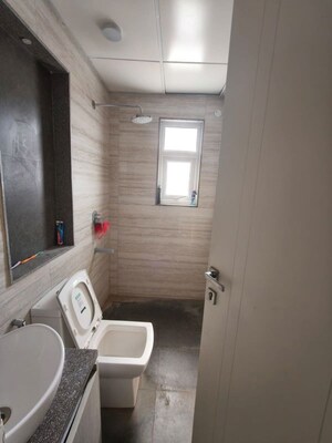 Bathroom in 2.5 BHK Builder Floor at Central Park Flower Valley, Sohna Sector 33 – for Rent