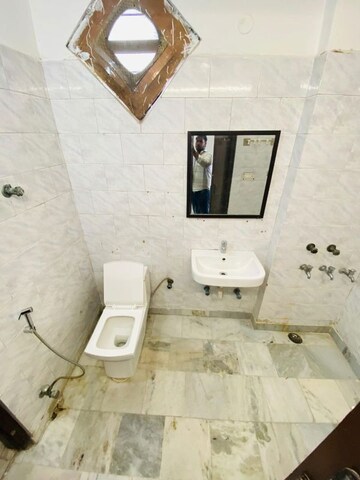 Bathroom in 4 BHK Apartment at Sector 11 Dwarka – for Rent