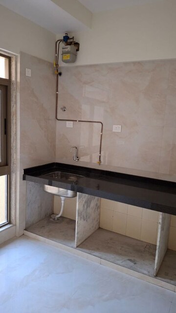 Kitchen in 2 BHK Apartment at Bhutra Mangal Karini Sky Breeze, Goregaon West – for Rent