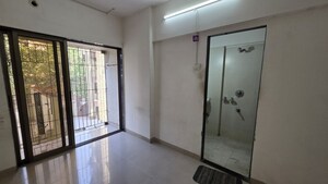 Room in 2 BHK Apartment at Beauty Palm CHS, Thane West – for Rent