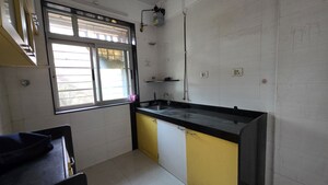 Kitchen in 2 BHK Apartment at Vasant Fiona, Pokhran Road No Two – for Rent