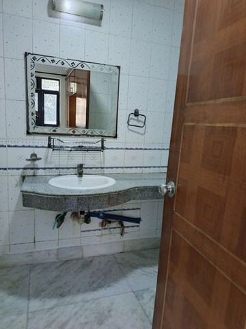 Bathroom in 2 BHK Apartment at Sector 14 Dwarka – for Rent