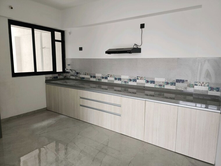 Kitchen, unique-youtopia 3 Bedroom 1350 Sq.Ft. Apartment In Kharadi Pune 10079906