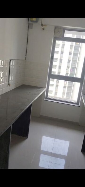 Kitchen in 2 BHK Apartment at Kalpataru Immensa, Kolshet Road – for Rent