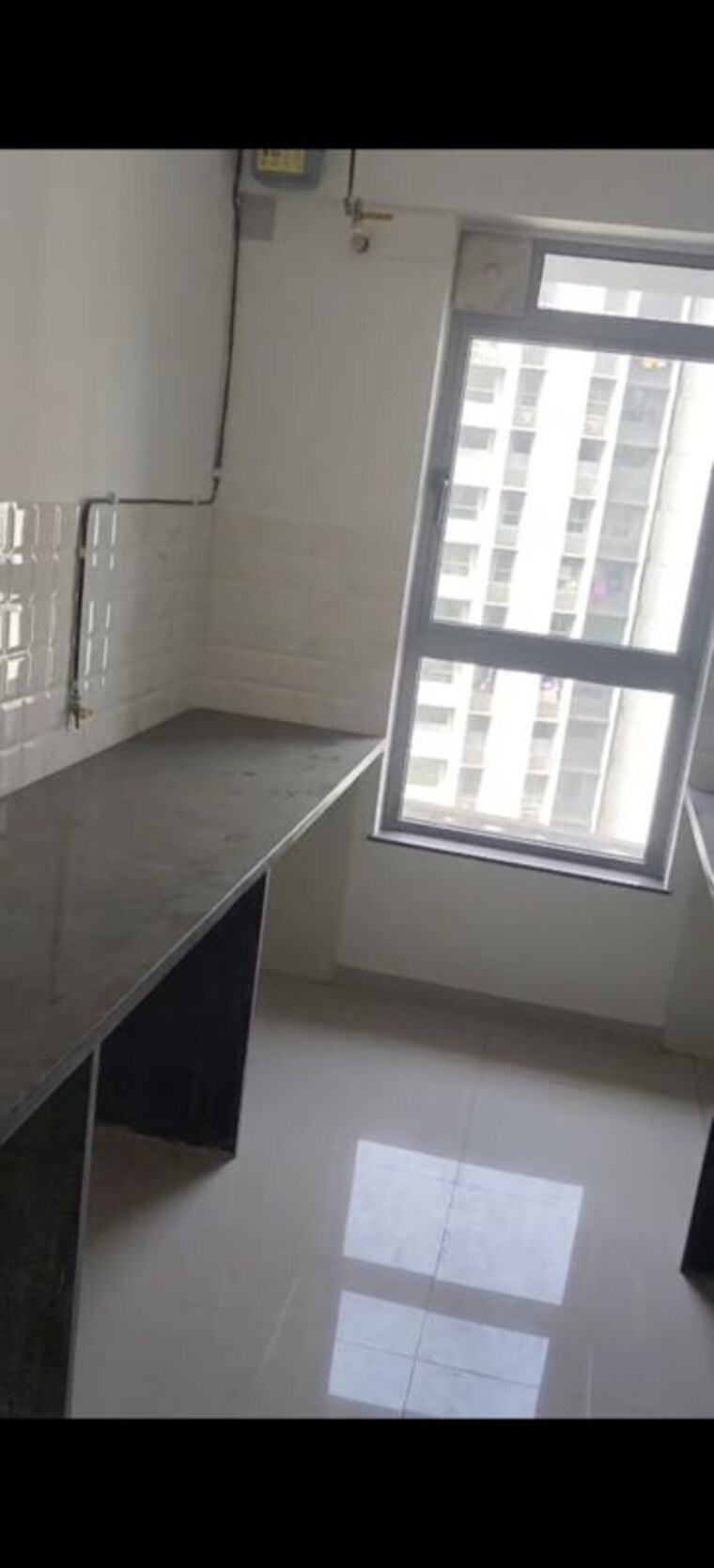 Kitchen, kalpataru-immensa 2 Bedroom 632 Sq.Ft. Apartment In Kolshet Road Thane 10079982
