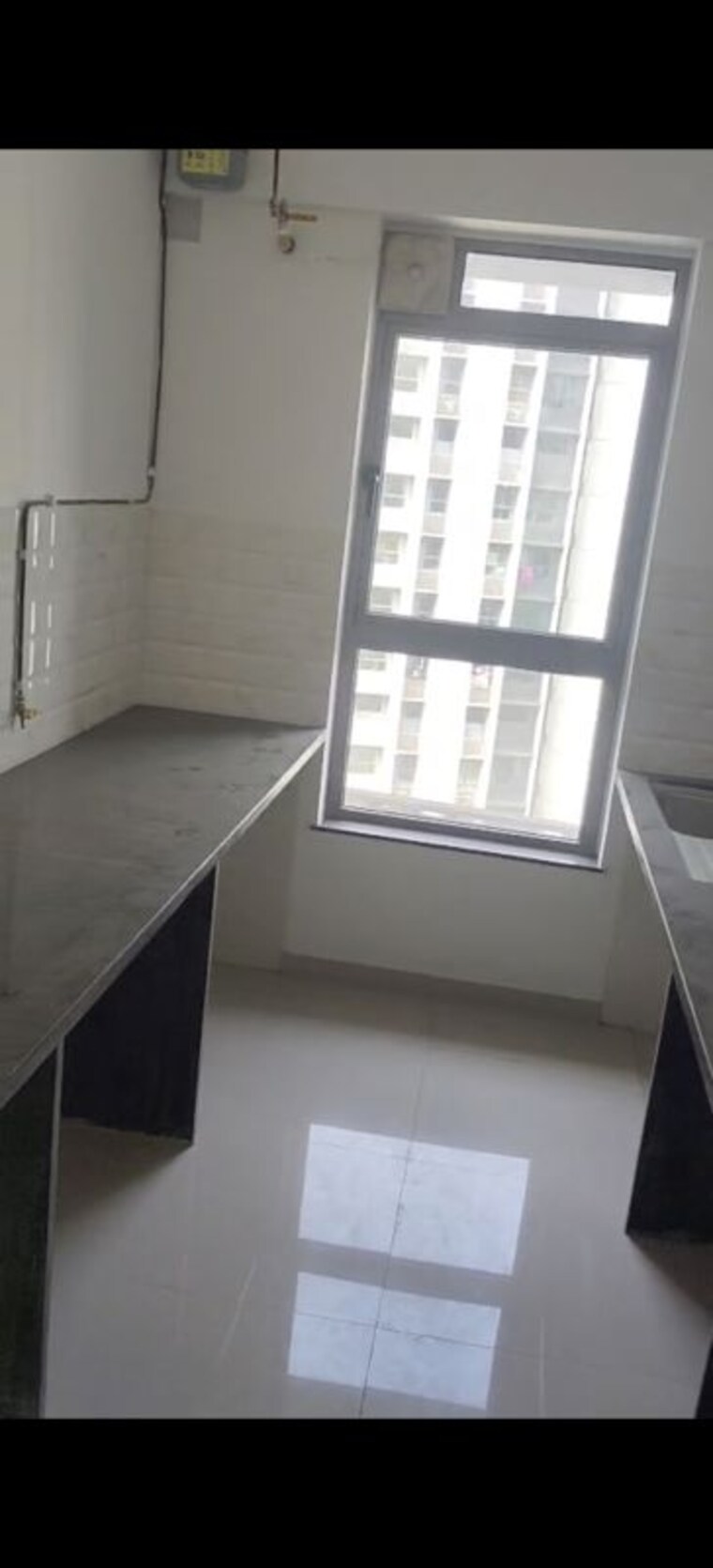 Kitchen, kalpataru-immensa 2 Bedroom 632 Sq.Ft. Apartment In Kolshet Road Thane 10079983