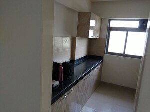Kitchen in 2 BHK Apartment at Lodha Splendora, Ghodbunder Road – for Rent