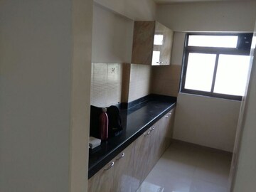 Kitchen in 2 BHK Apartment at Lodha Splendora, Ghodbunder Road – for Rent