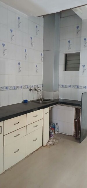 Kitchen in 1 BHK Apartment at Ahura Nishant, Model Colony – for Rent