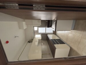 Kitchen in 2 BHK Apartment at Shapoorji Pallonji Alpine 2, Kandivali East – for Rent