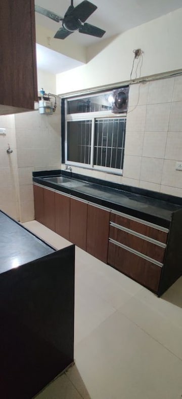 Kitchen in 3 BHK Apartment at Om Shantidham CHS, Mira Road – for Rent