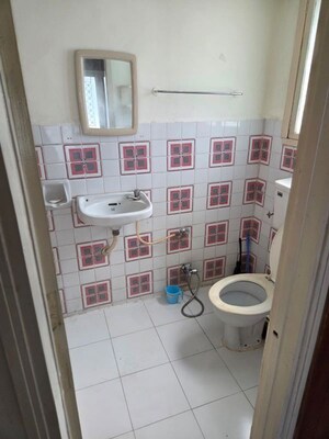 Bathroom in 2 BHK Apartment at Ajit Appartment, Model Colony – for Rent