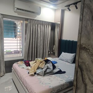 Bedroom in 2 BHK Apartment at DLH Metroview, Andheri West – for Rent