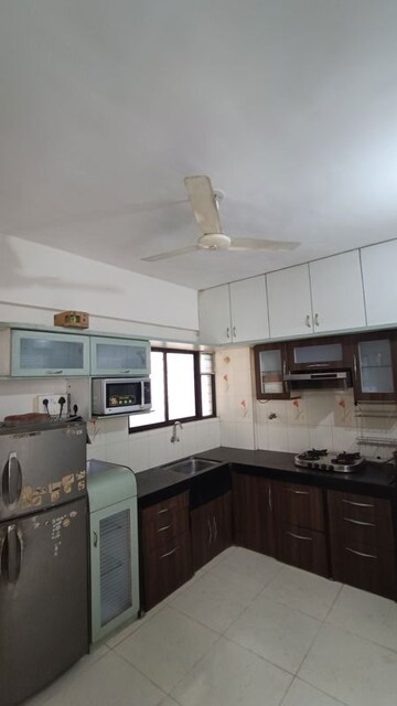 Kitchen in 3 BHK Apartment at Laxmi Vridavan, Pimple Saudagar – for Rent