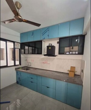 Kitchen in 2 BHK Apartment at Unique Youtopia, Kharadi – for Rent